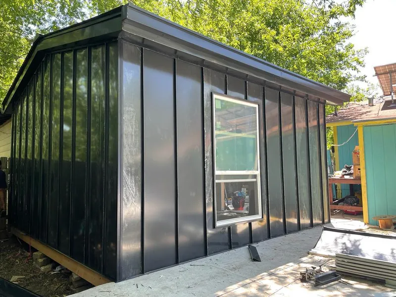 Black standing seam metal wall panels for Metal Roof Installation in North Coventry