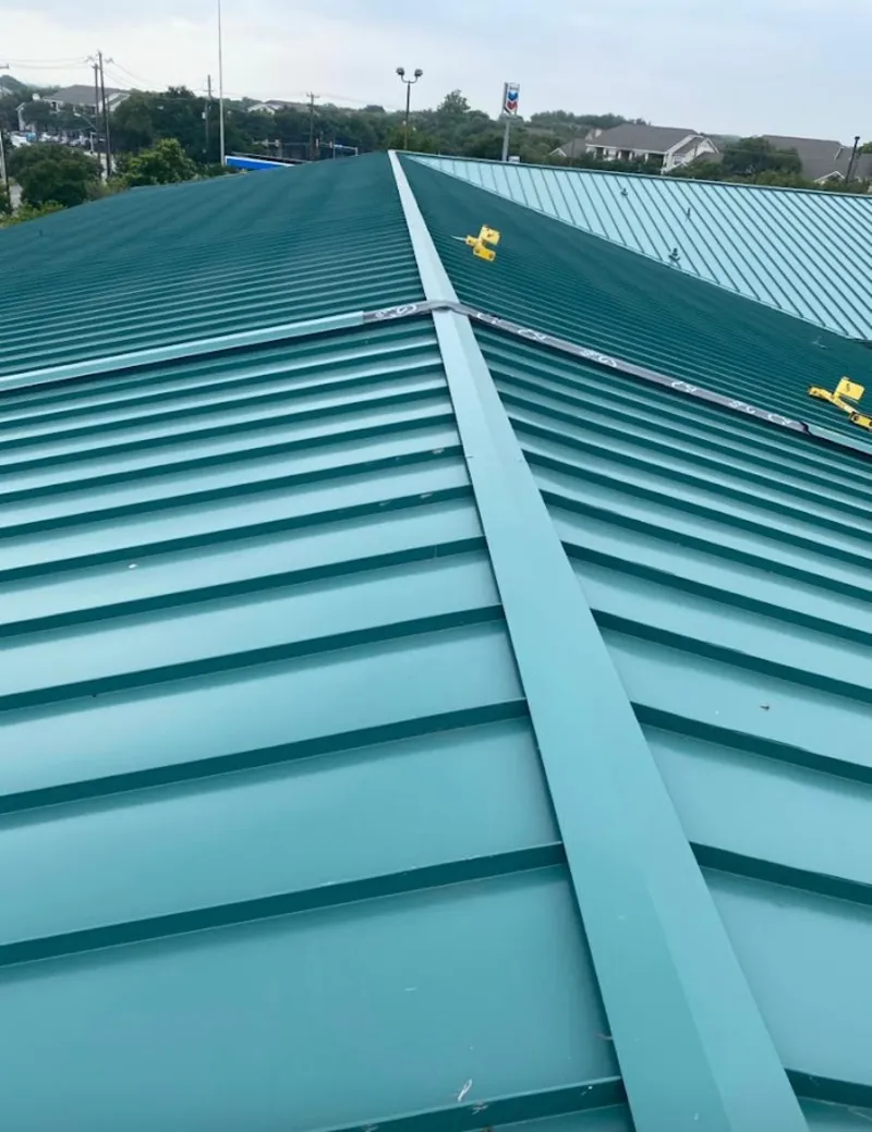 Green commercial metal roof ridge and valley for Metal Roof Repair in North Coventry