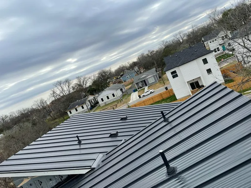 Standing seam metal roof panels with vents for Skylight Repair in North Coventry